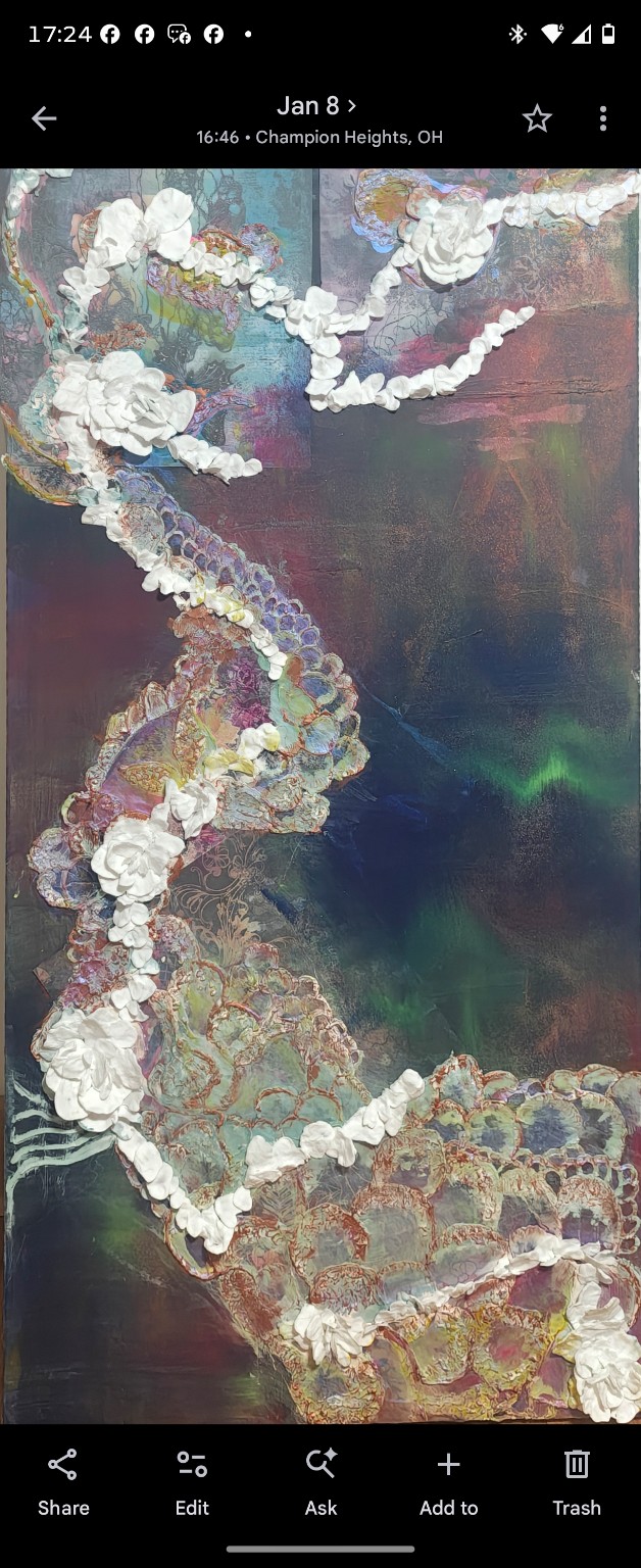 Pale, clustered organic structures winding across a tall, dark, textured surface