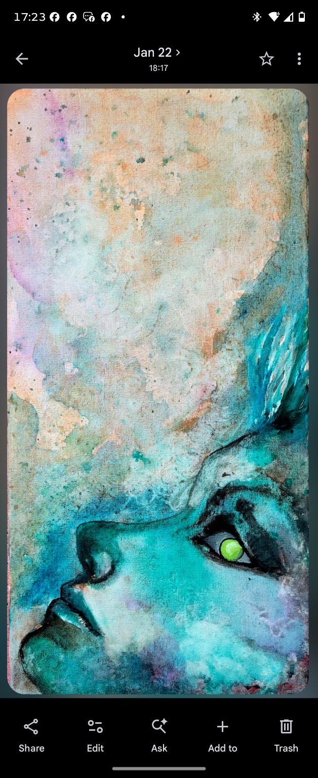 Upward-looking turquoise face with a bright green eye and pale, textured space above